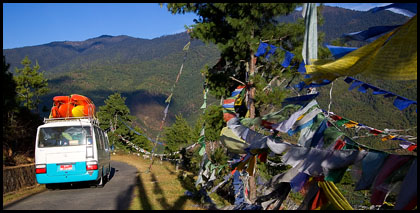 bus_prayer_flags_capital_Thimpu_Bhutan