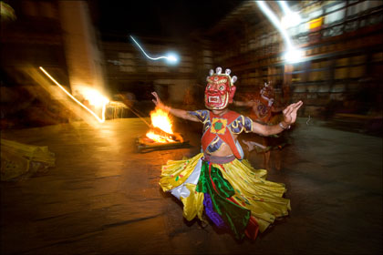 monk_traditional_masked_dance_night_performance_Bhutan.